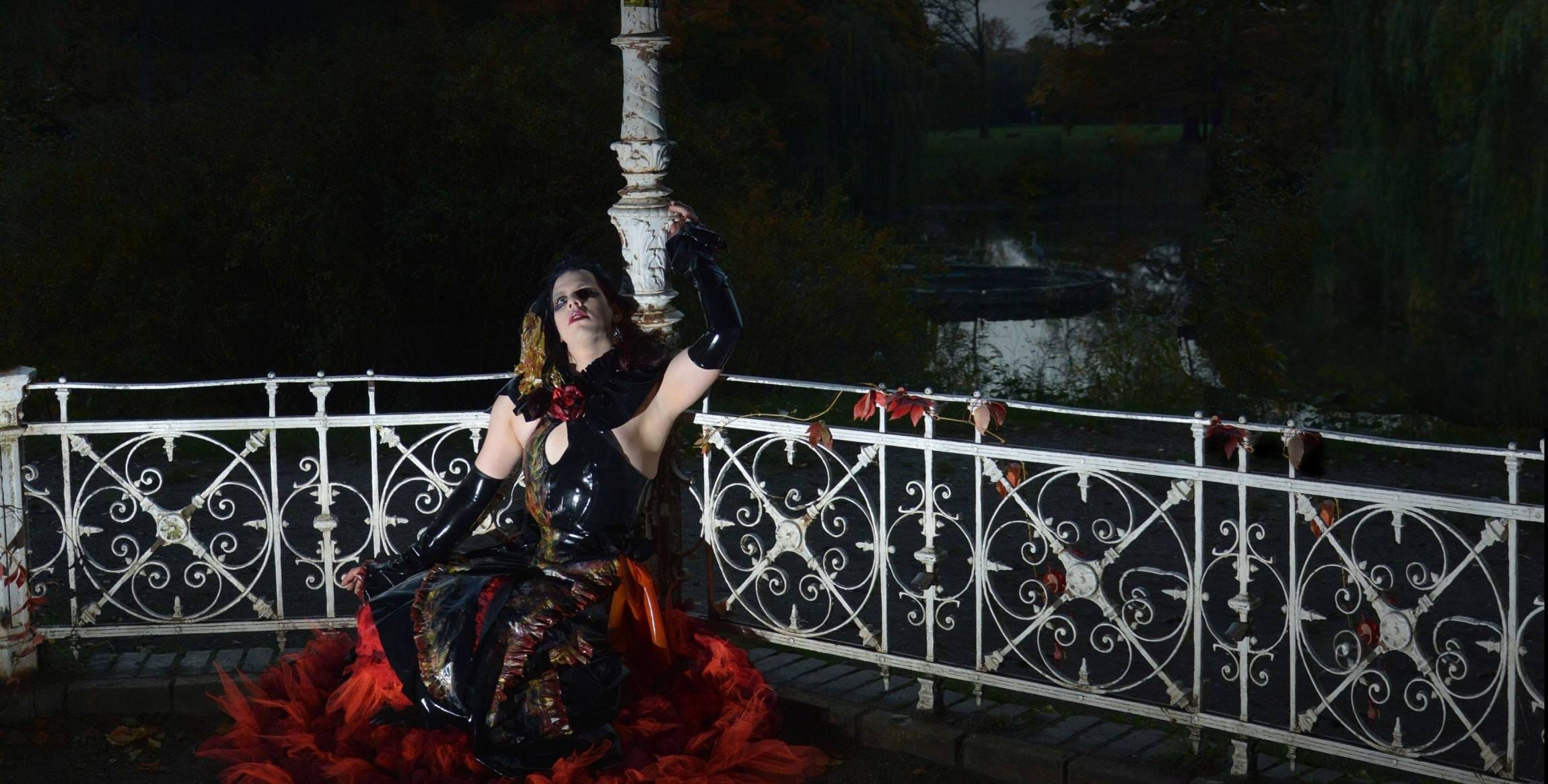 once in a lifetime shooting showing a latex dress in fire colors