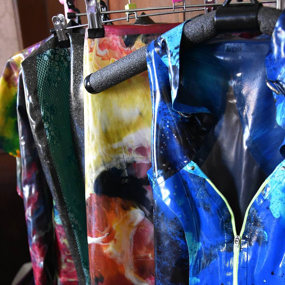 different clothing pieces in various colors on a rack