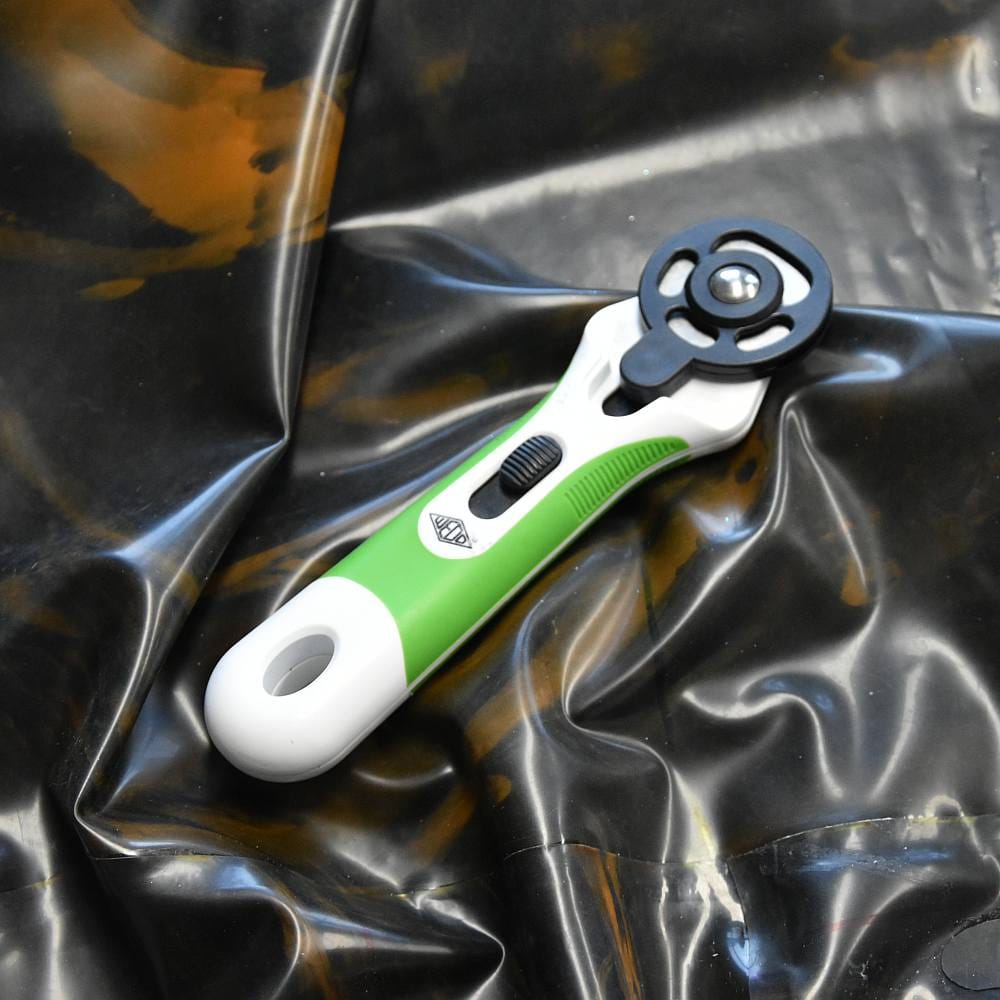 roller cutter on a latex sheet