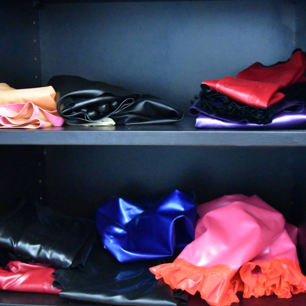 black shelf with latex items