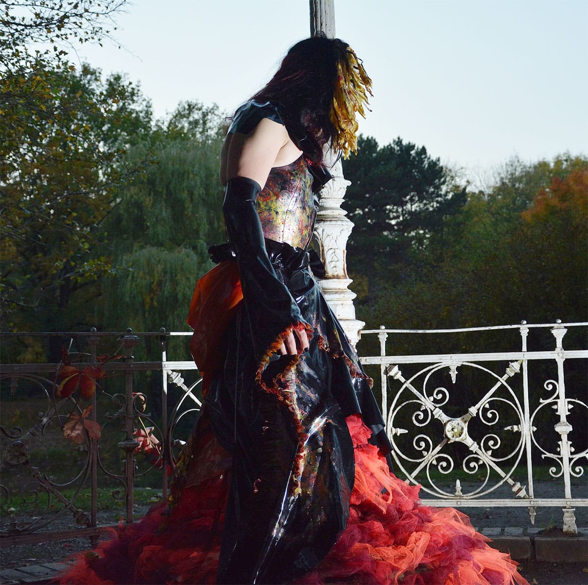 once in a lifetime shooting showing a latex dress in fire colors