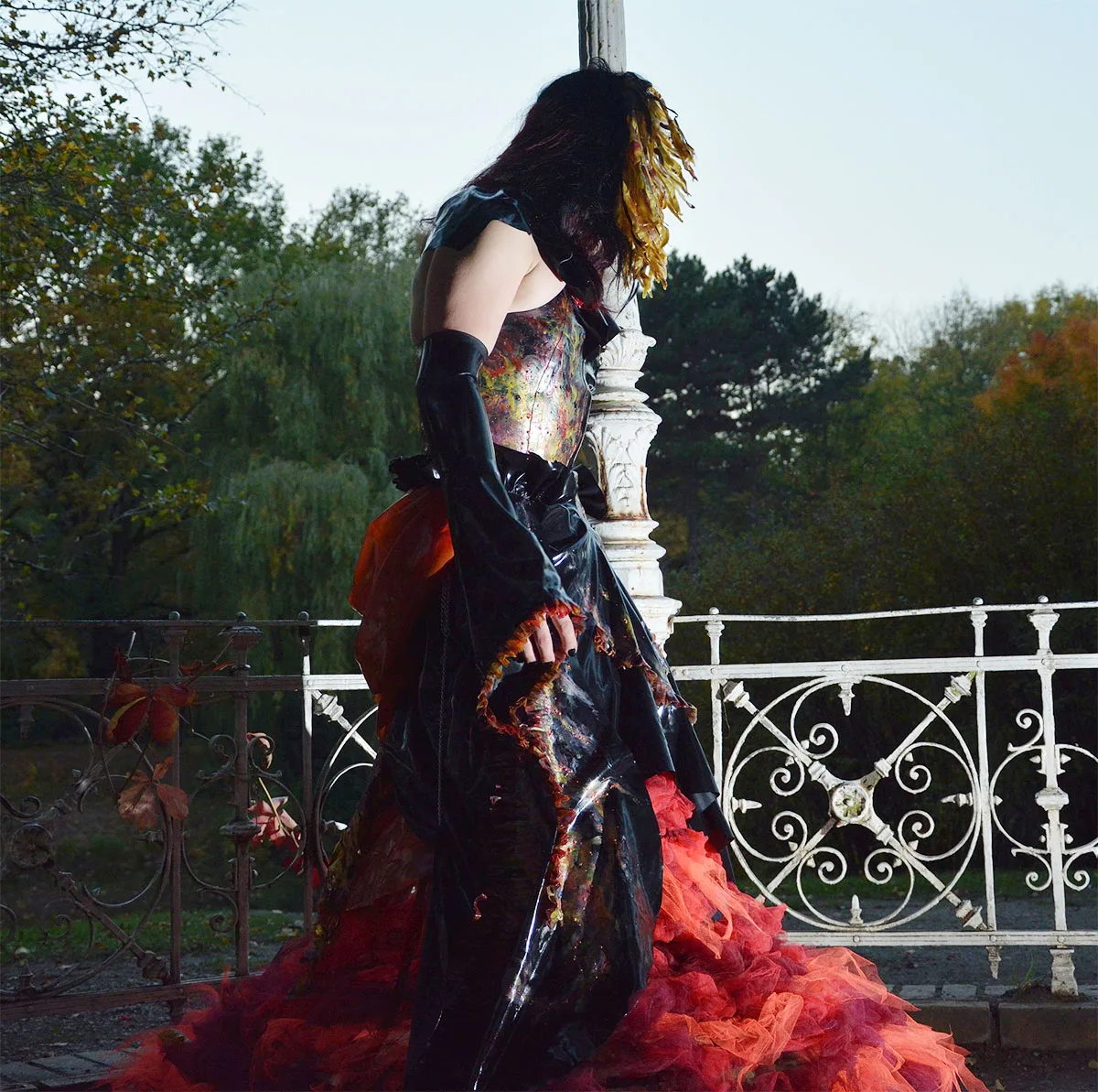 once in a lifetime shooting showing a latex dress in fire colors