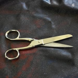 scissors on a latex sheet