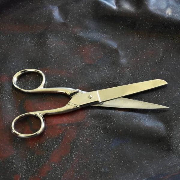 scissors on a latex sheet