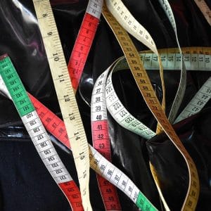 detail of measuring tapes on a latex item