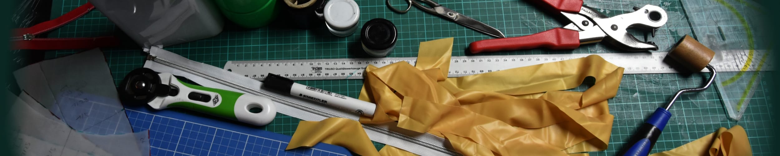 several tools for latex creation on a cutting mat