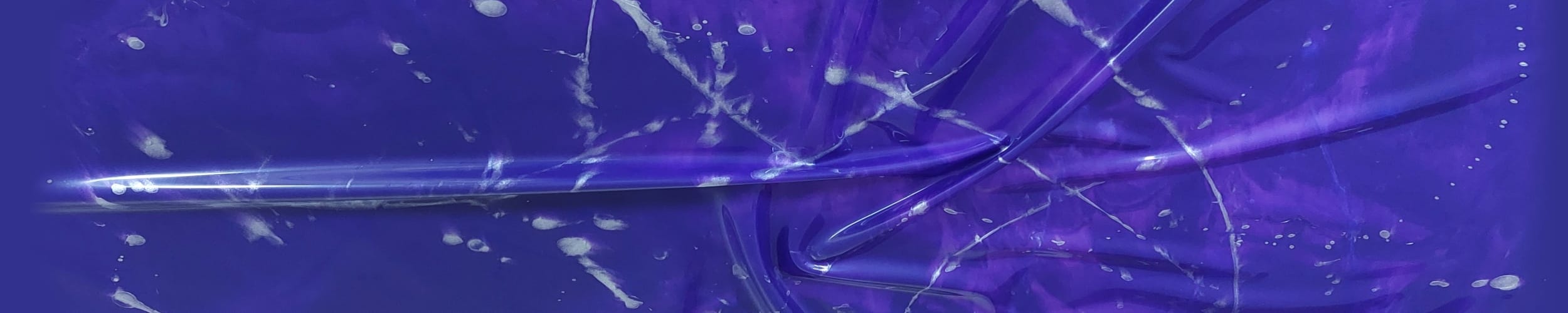 purple sheet with white sprinkles