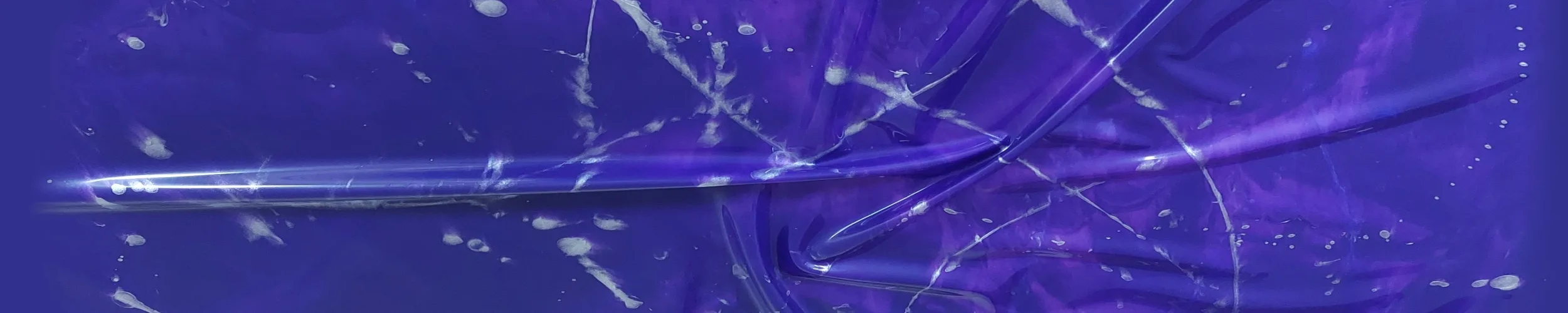 purple sheet with white sprinkles