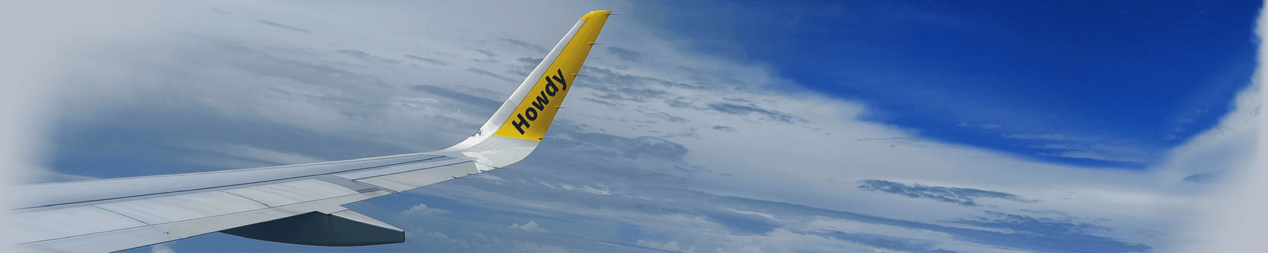 view onto a cloudy sky from an airplane