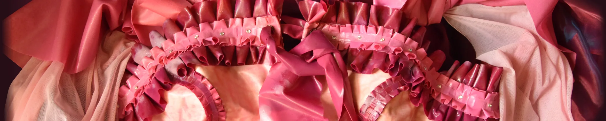 detail of a pink once in a lifetime dress