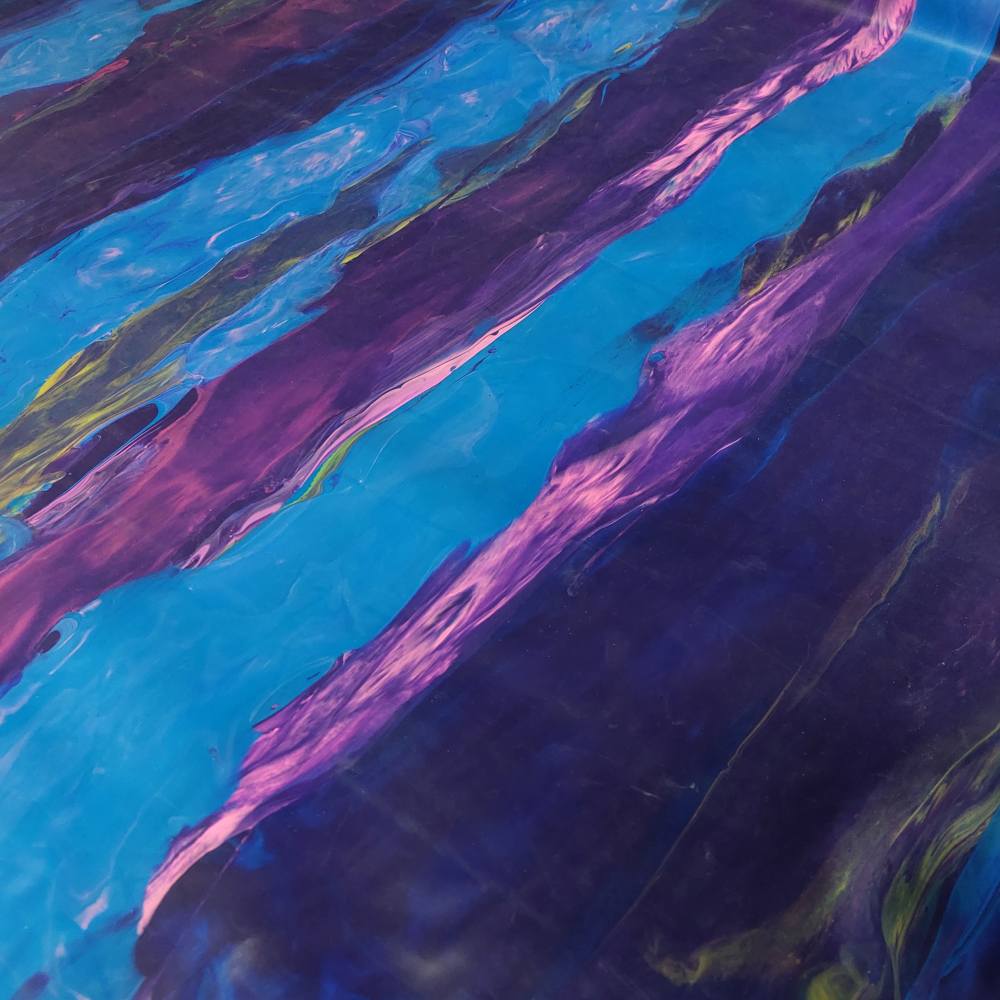 blue and purple latex sheet in a linear marble pattern