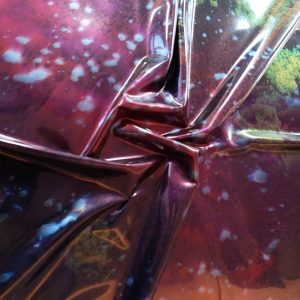 latex sheet with a dark colorful galaxy pattern