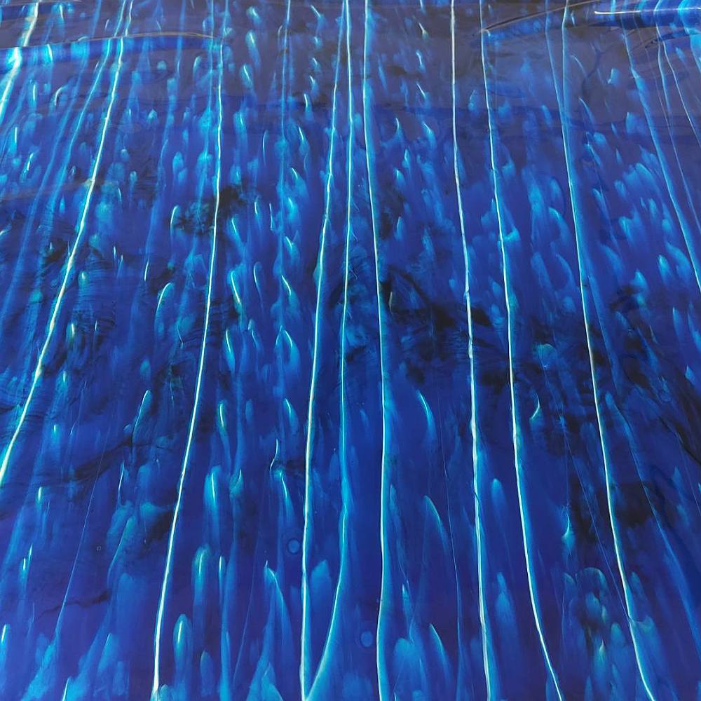 blue latex sheet with organic water patterns