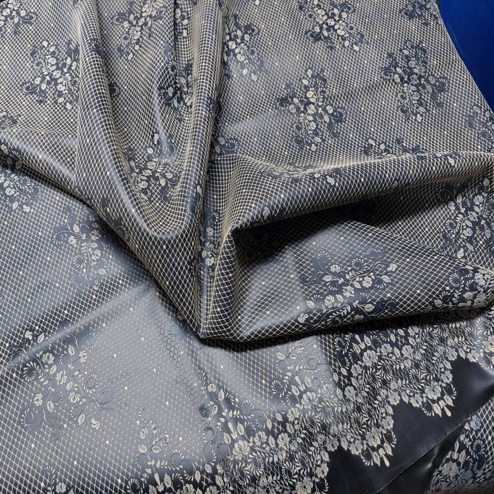 black latex sheet with neon orange lace pattern