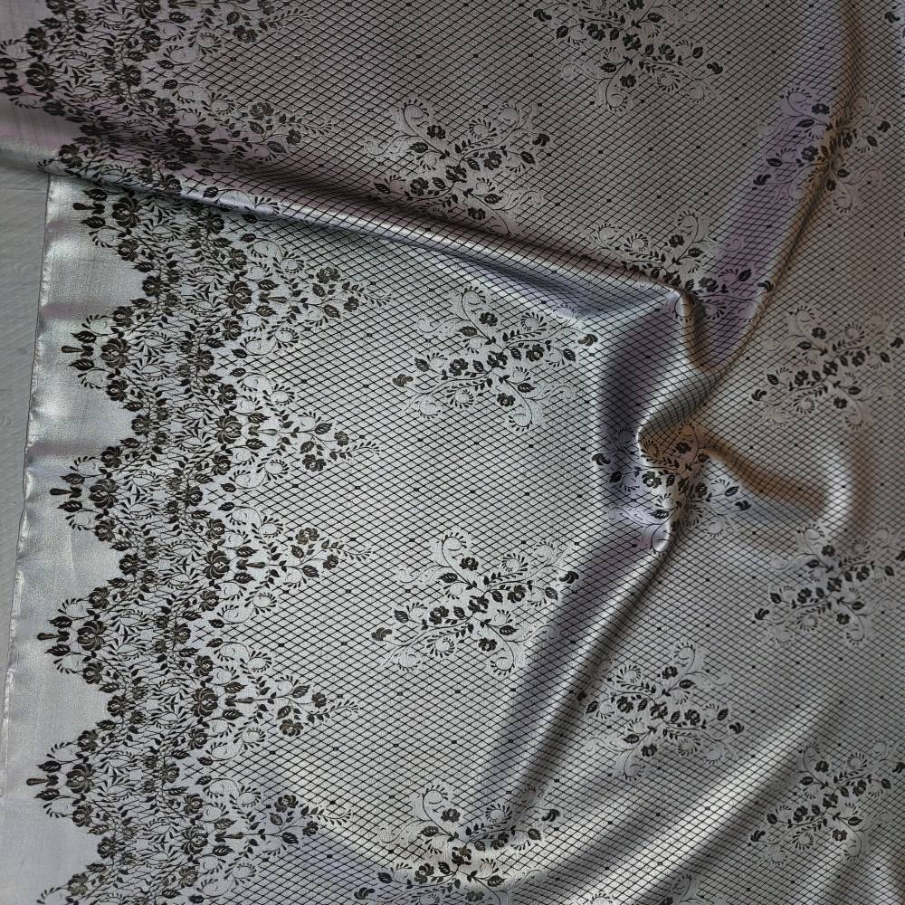 silver latex sheet with a black lace pattern