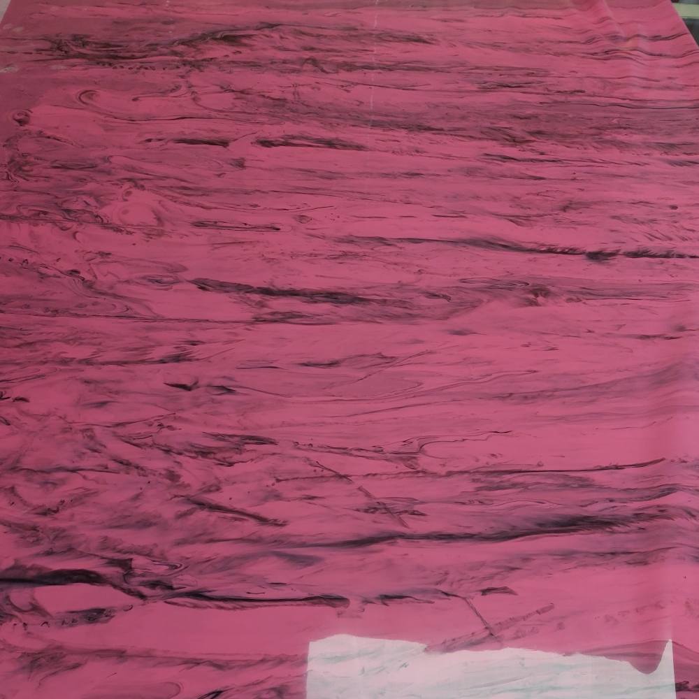 pink black latex sheet in a linear marble pattern