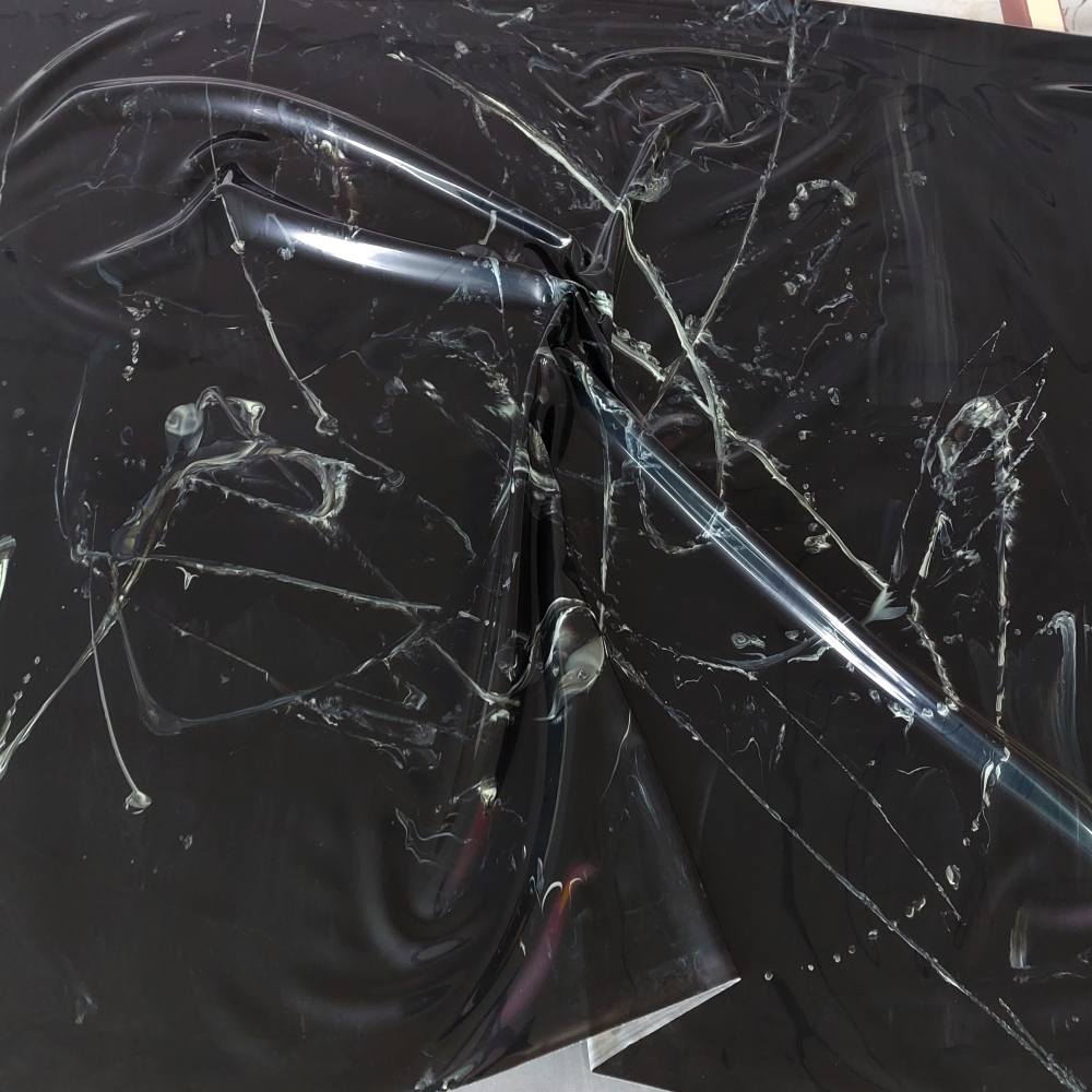 black latex sheet with neon green strokes