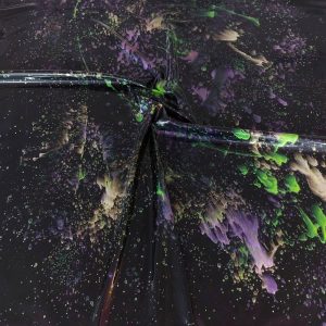 black latex sheet with a neon active splatter pattern