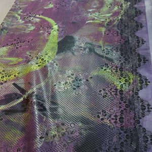 marbled latex sheet with a black lace pattern