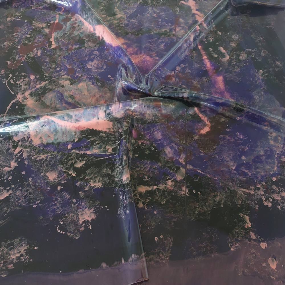 latex sheet with a punk and purple splatter pattern