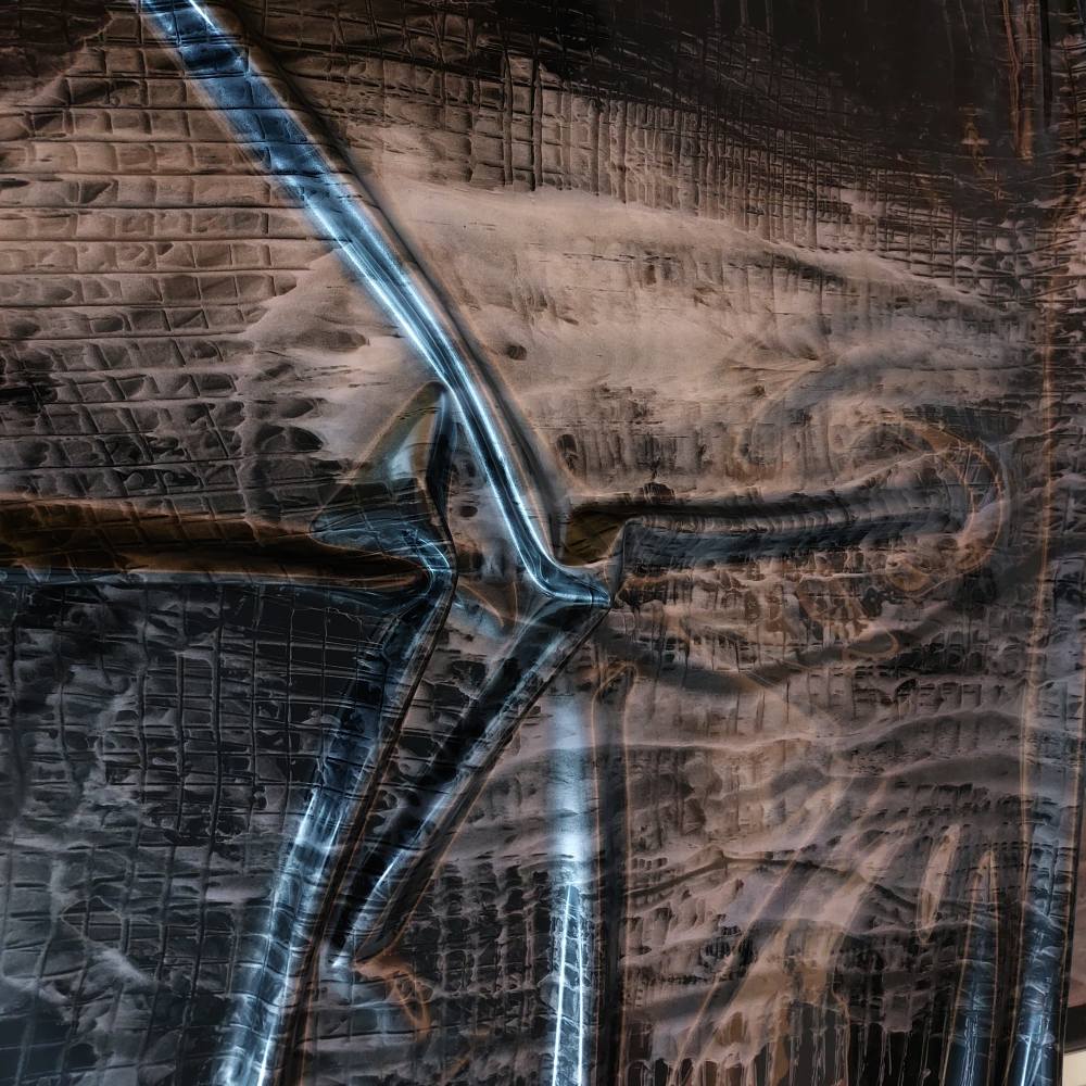 black latex sheet with a silver tweed pattern