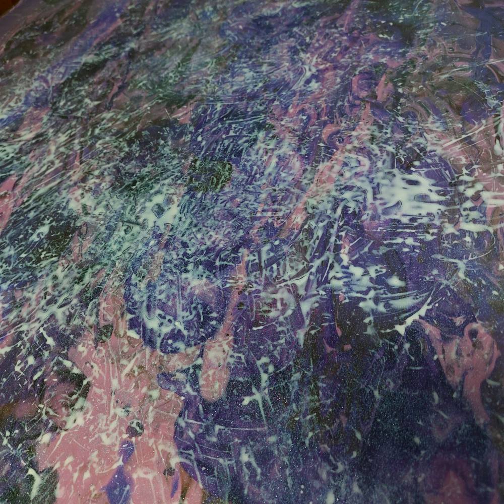 latex sheet in a purple and white splatter pattern