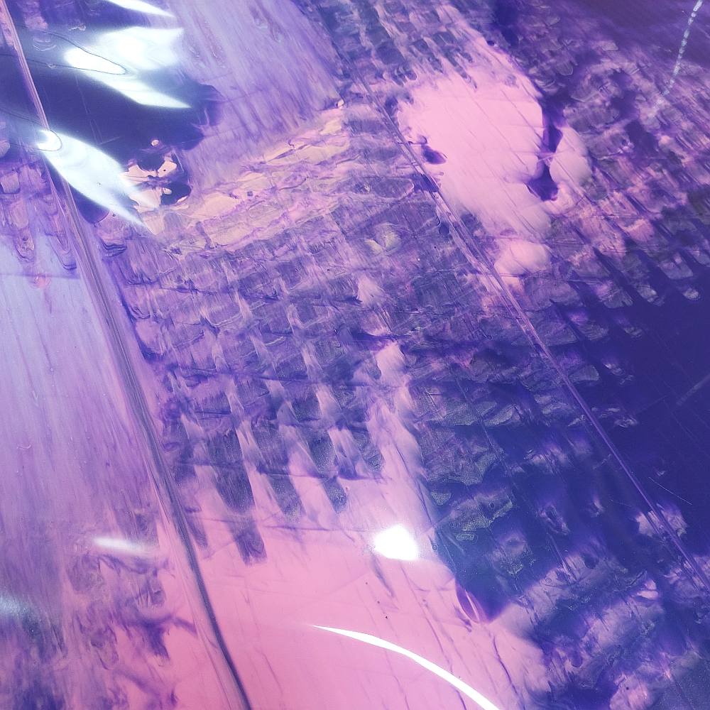 pink and purple latex sheet in a tweed pattern